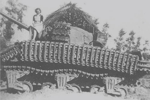 Sherman with Tiger or Panther tracks.jpg