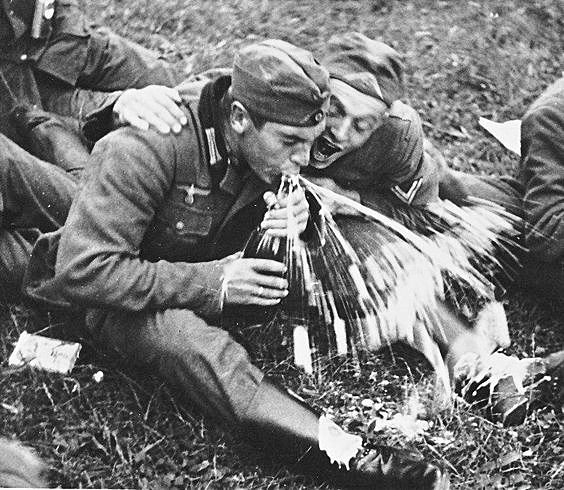Two German soldiers drink champagne.jpg